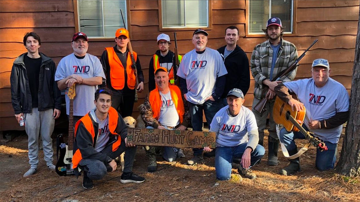 7N1D-shirts-hunting-group-1 Hunters at a cabin wearing Noah Strong Merch