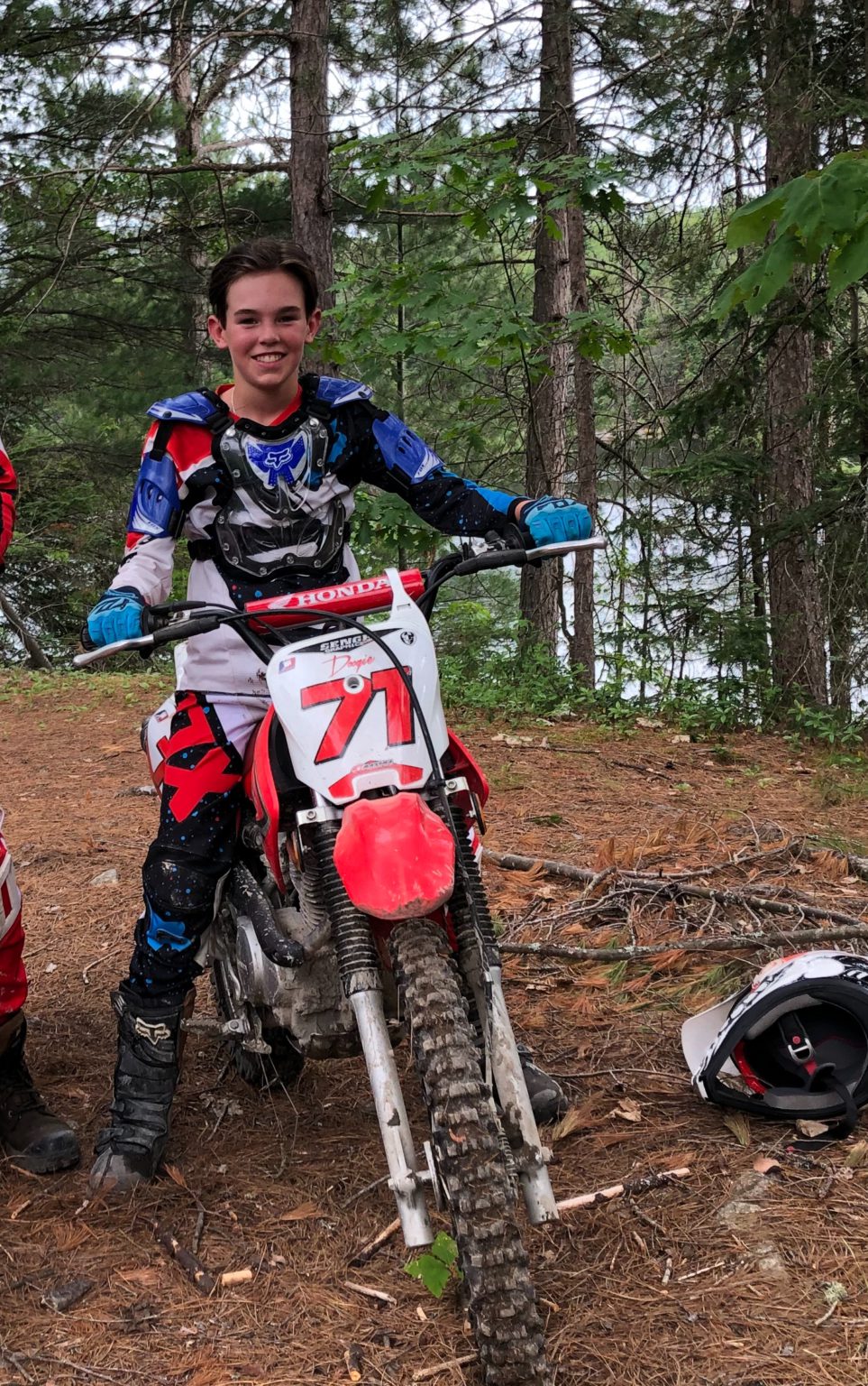 Noah sitting on a dirtbike