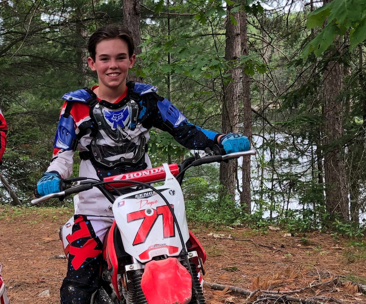 Noah sitting on a dirtbike