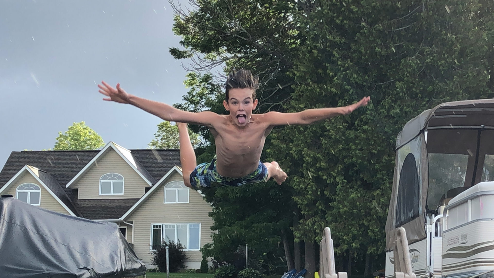 Noah-jumping-in-lake Noah Dugas jumping into a lake